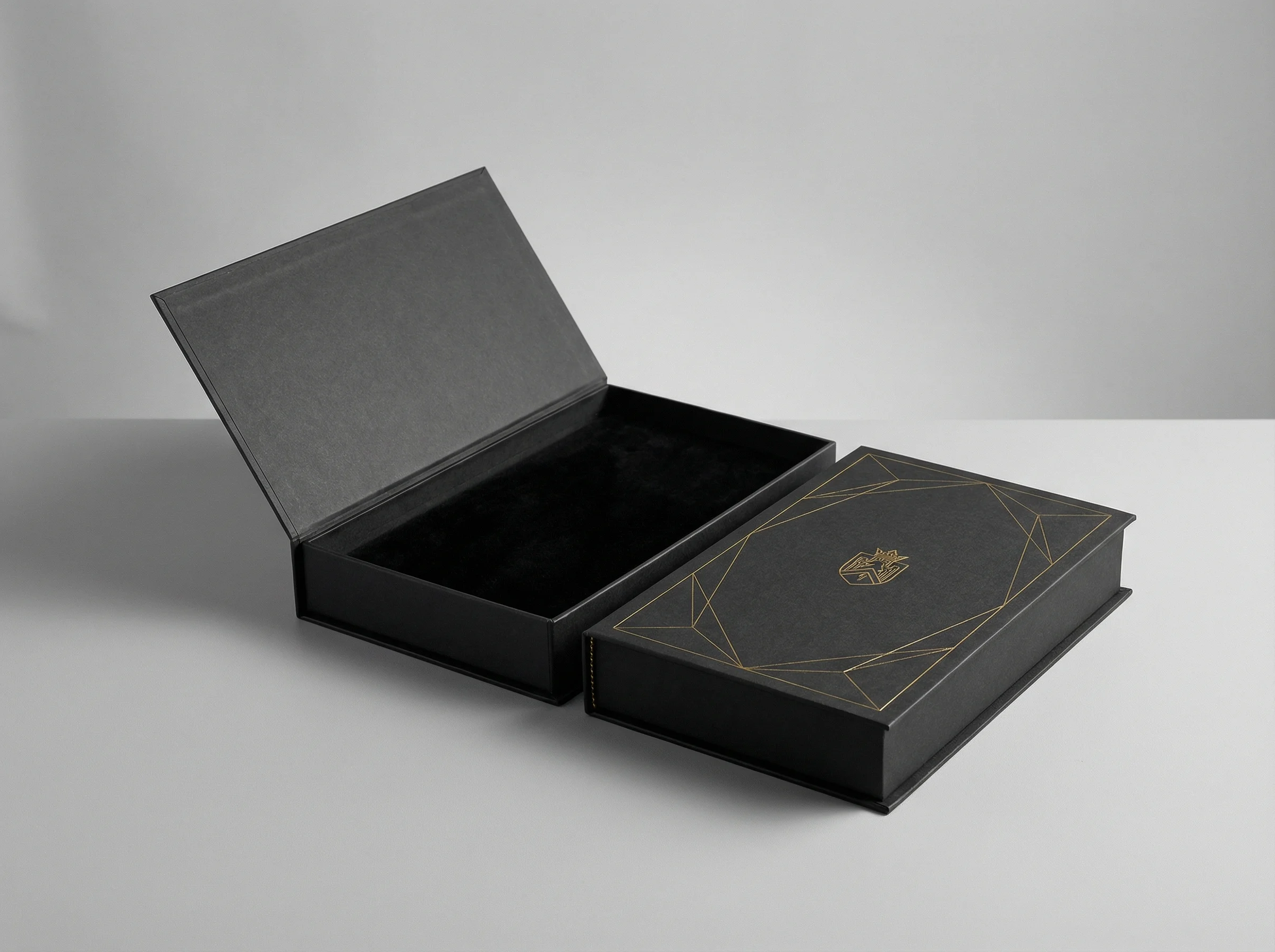 Book-style rigid paper box with velvet insert for collector edition product packaging.