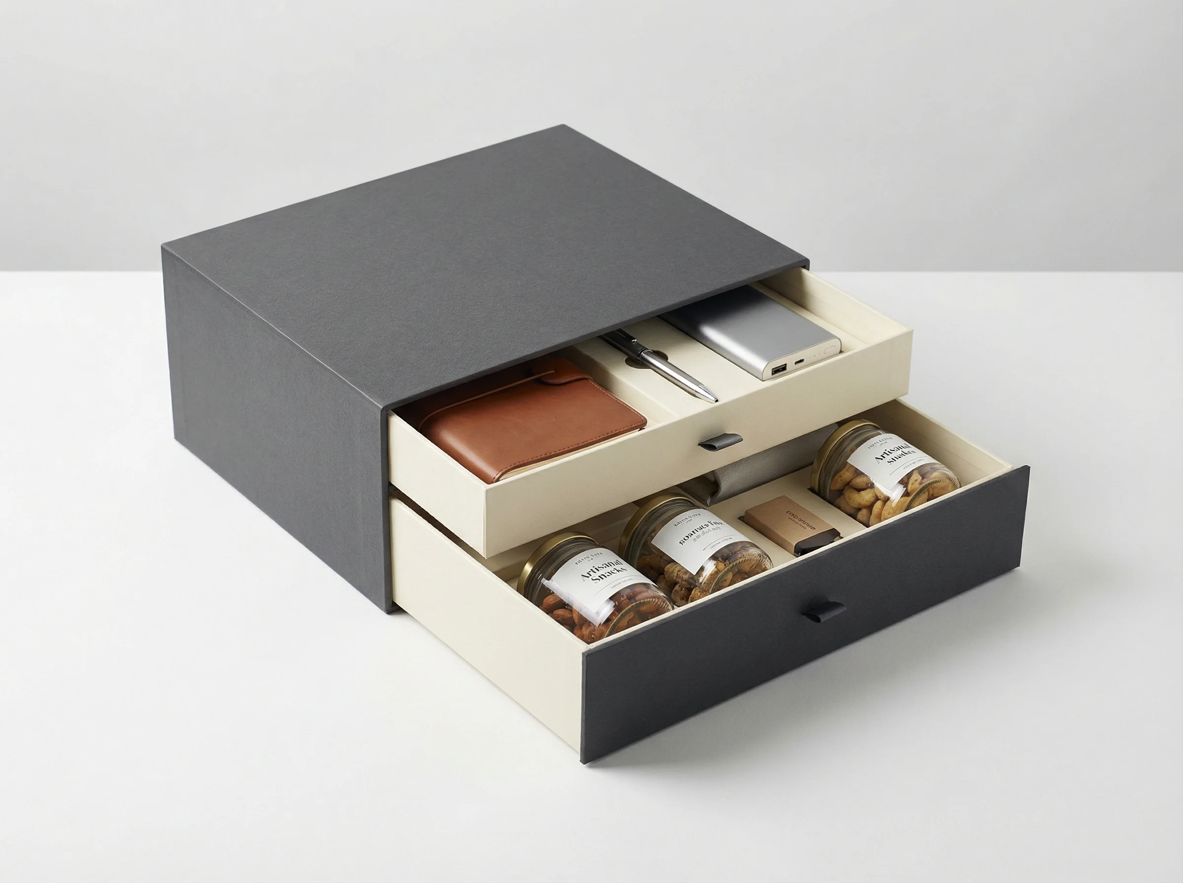 Drawer-style rigid paper box with two-layer tray for corporate gift kit packaging.